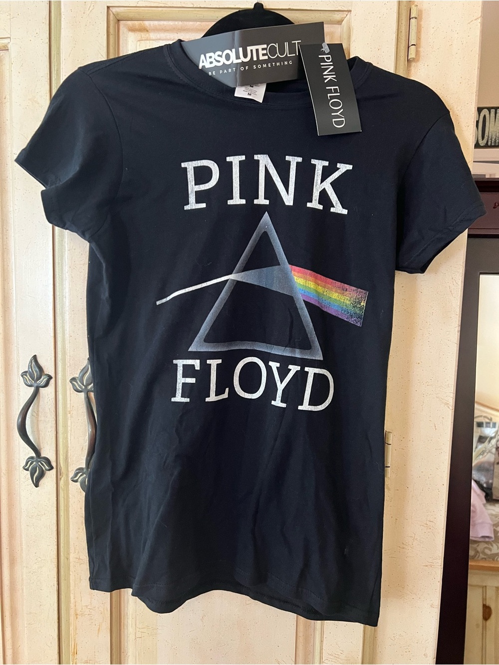Pink Floyd Black Kids Tee with Rainbow Prism Graphic very fitted.
